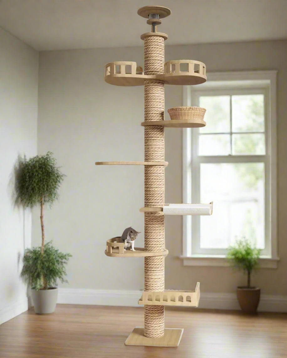 PurrLux Floor-to-Ceiling Cat Tree in a minimalist living room, featuring a grey and white cat comfortably resting on a multi-level shelf in a soft sun glow.