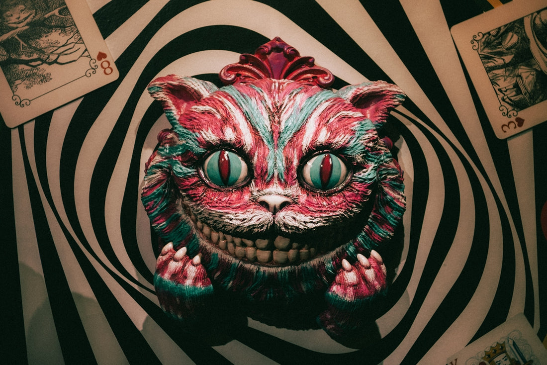 Cheshire cat mask with swirling black and white background